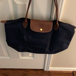 Longchamp Navy purse.